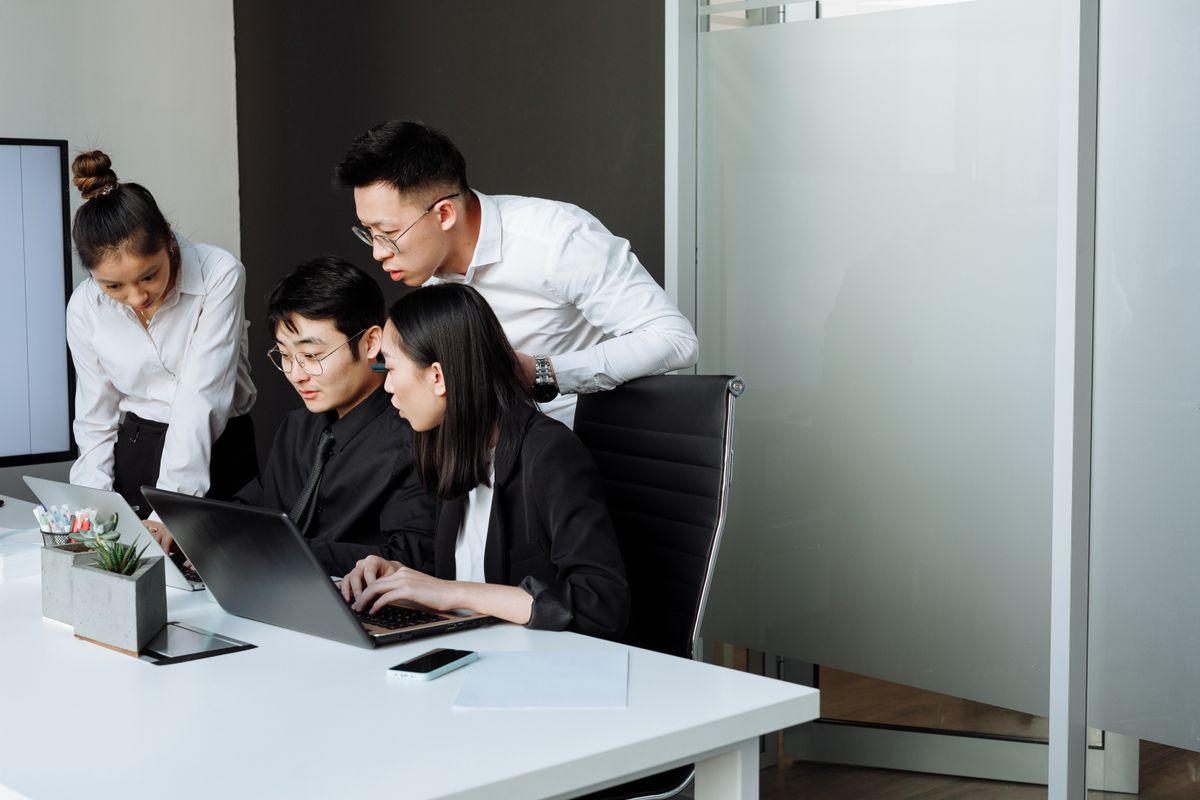 Professionals collaborating on a business process